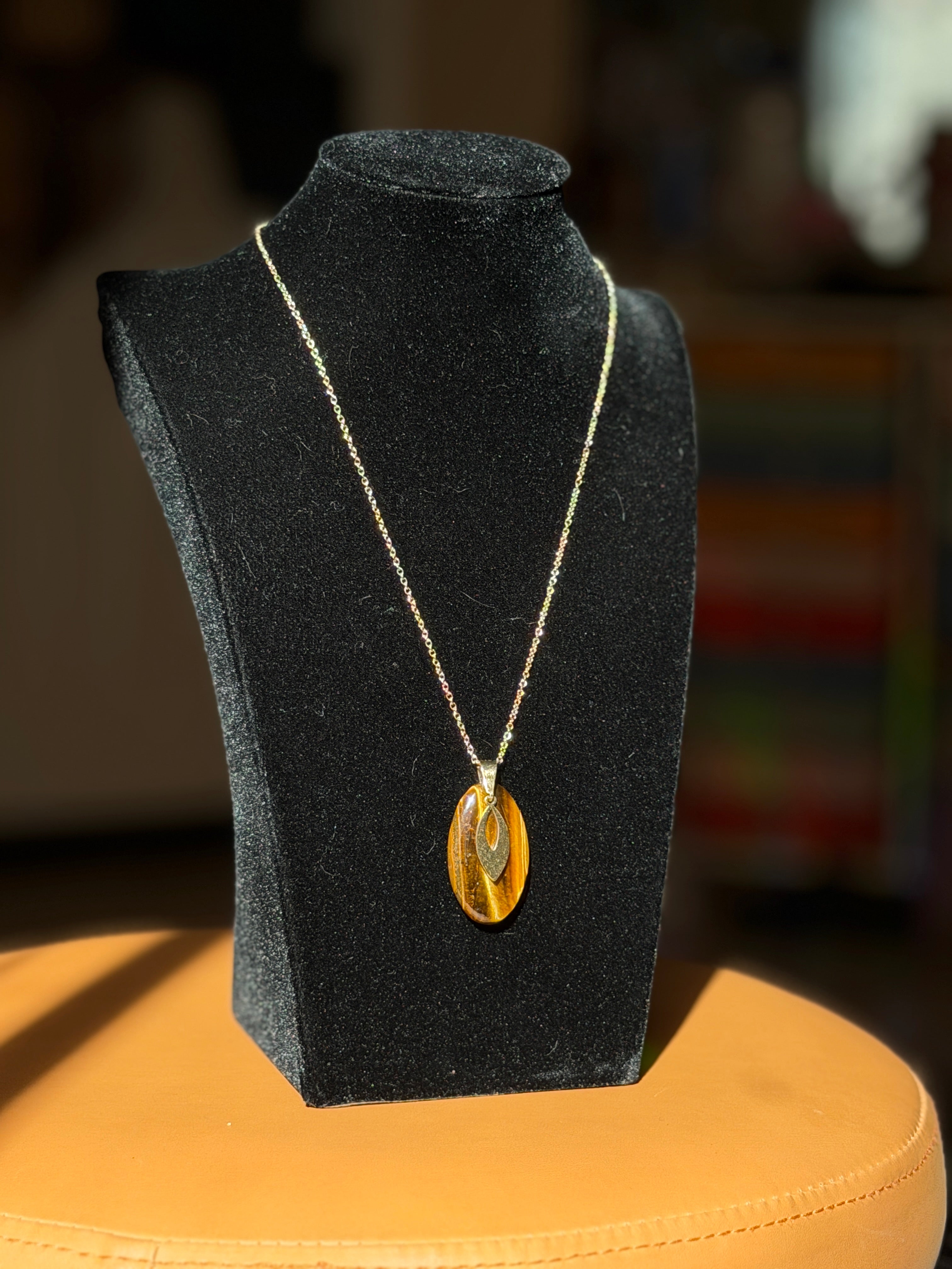 tigers eye necklace with gold pendant