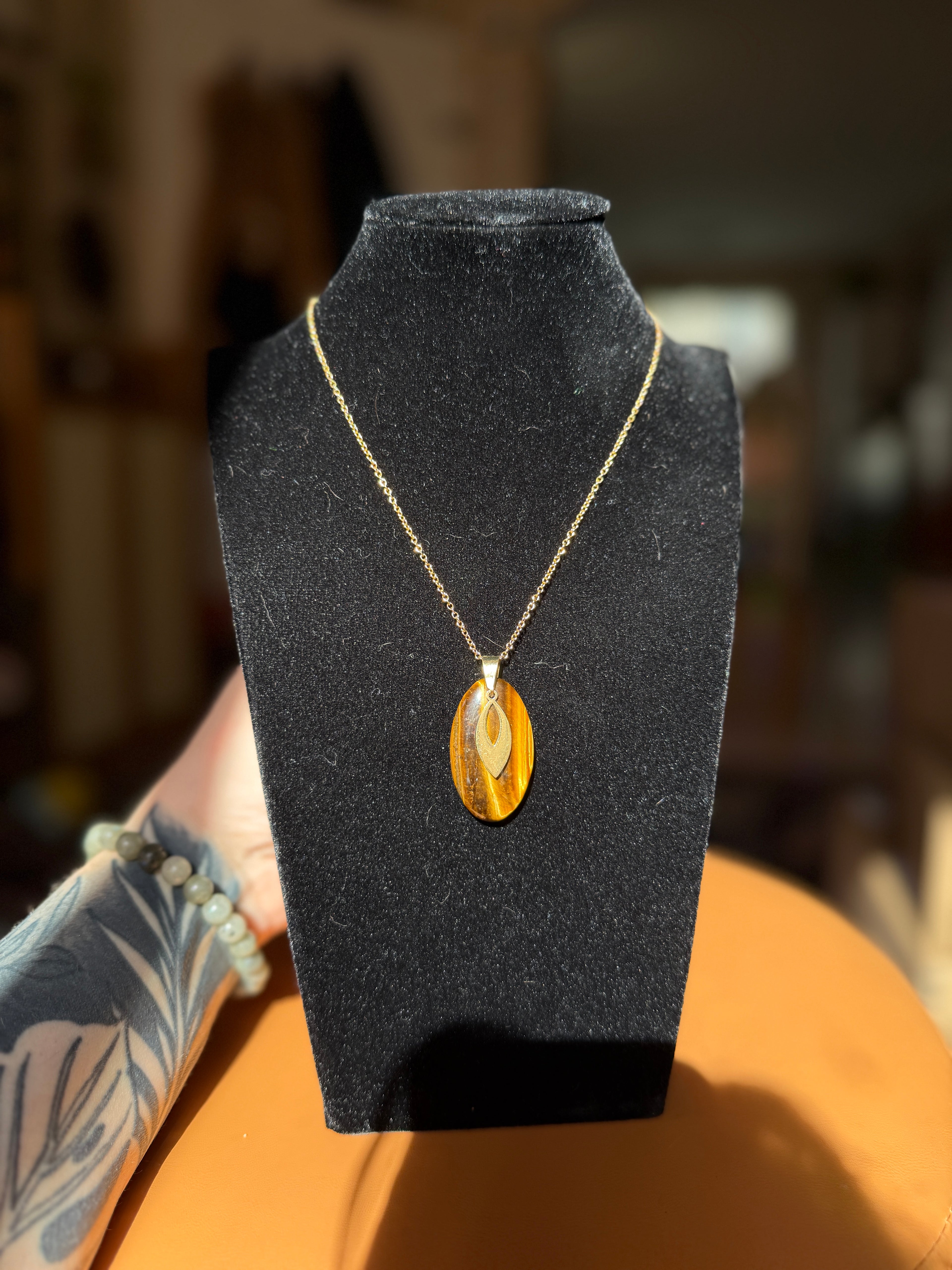 tigers eye necklace with gold pendant